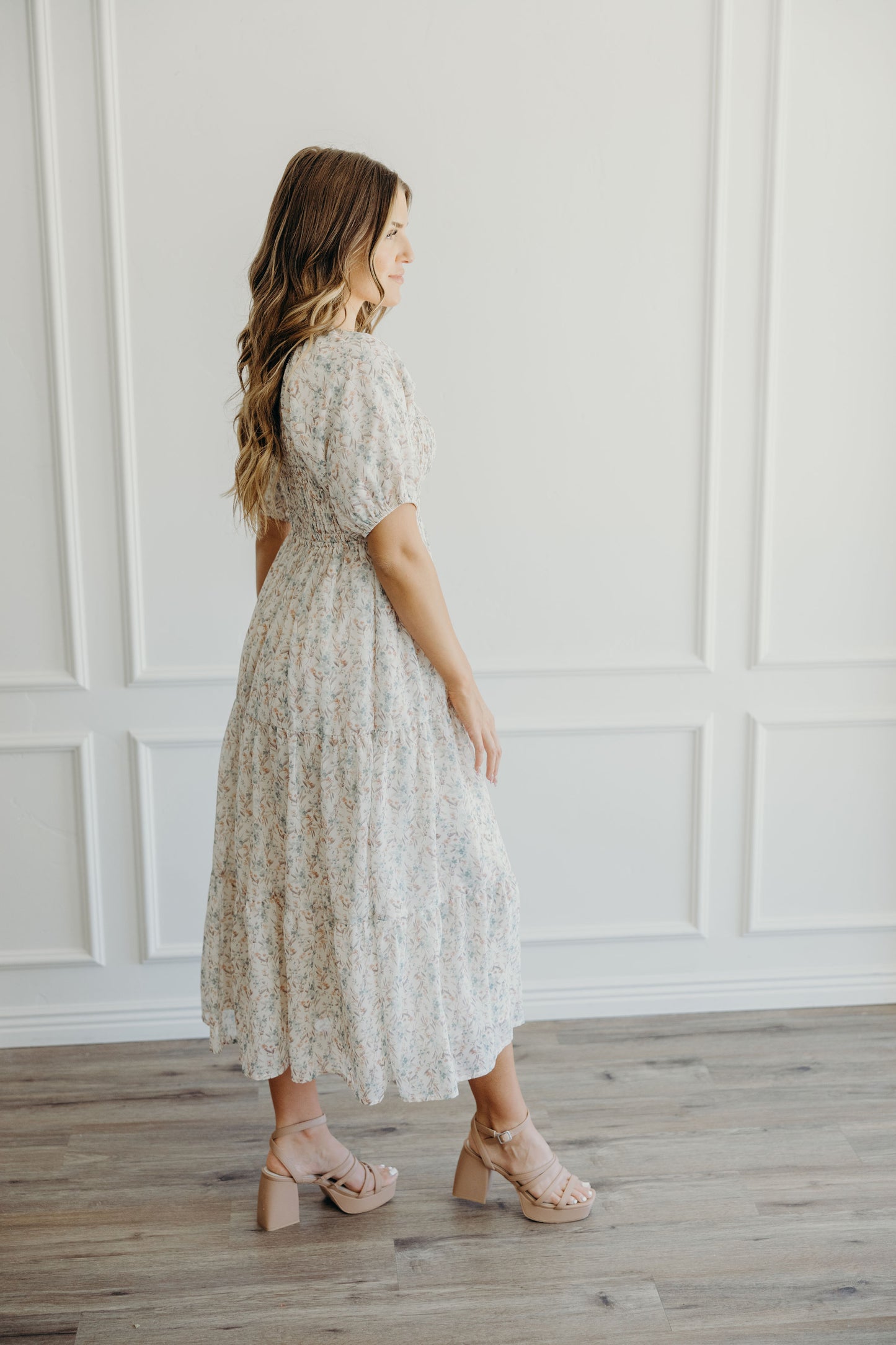 pink and sea glass green print floral midi dress with puff sleeves.