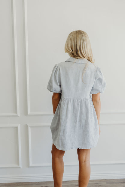 Back of short textured dress with collar detail. 