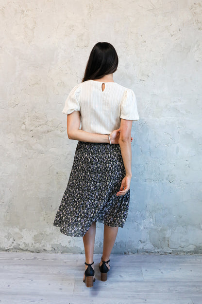 PLEATED MIDI SKIRT IN GRAPEVINE